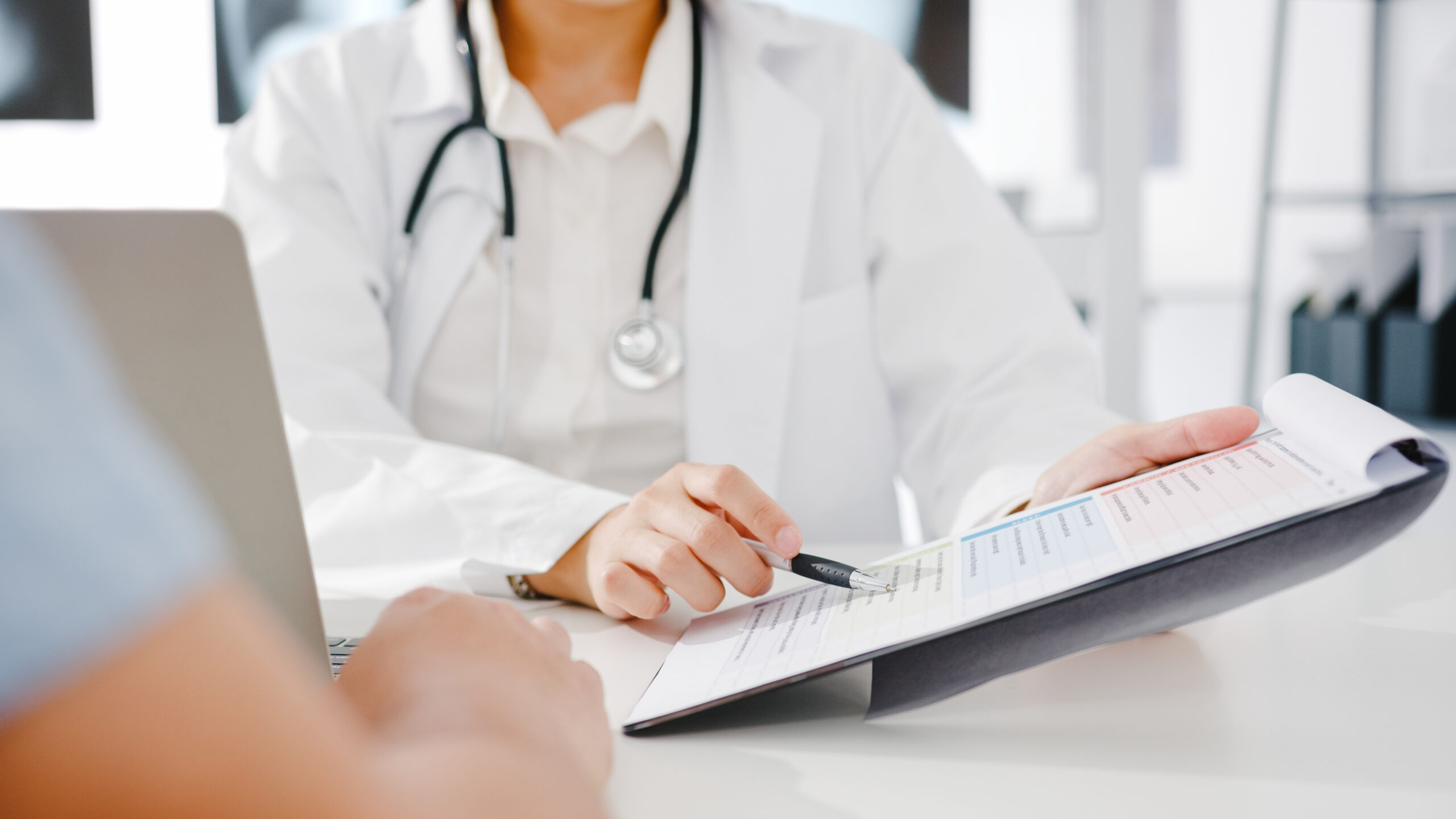 Doctor goes over her findings with a patient