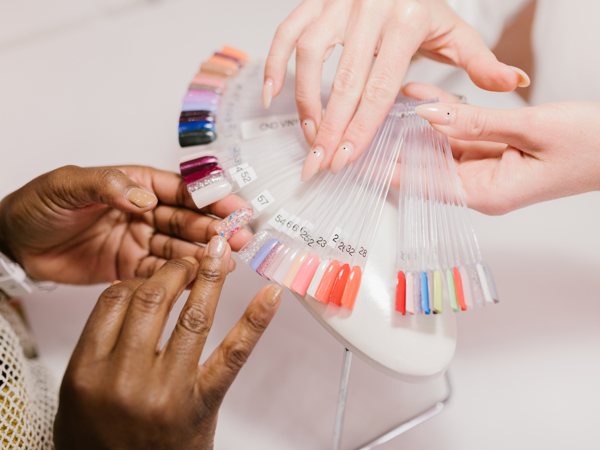 Woman choosing nail colour