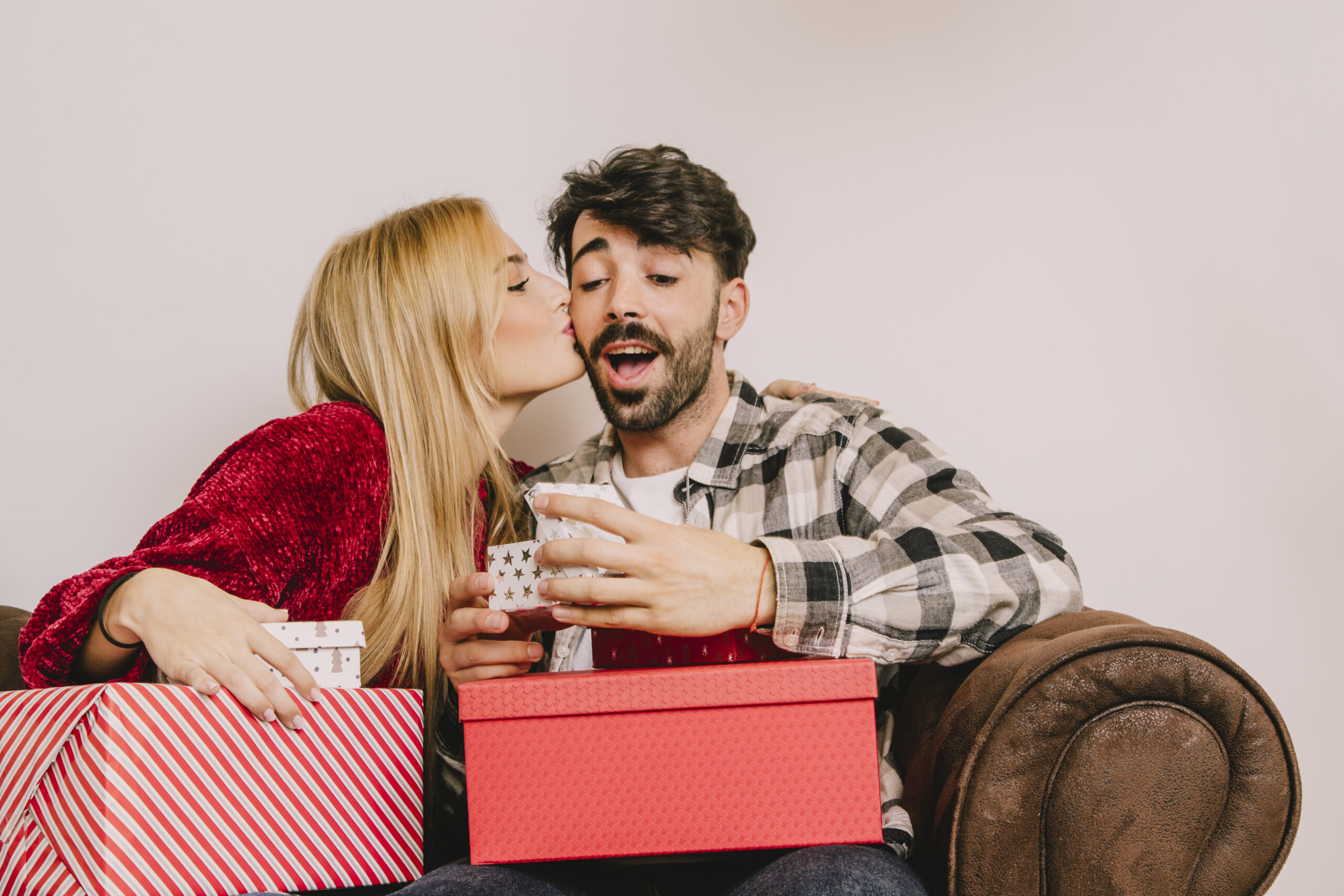 Woman kisses her boyfriend on Valentine's Day