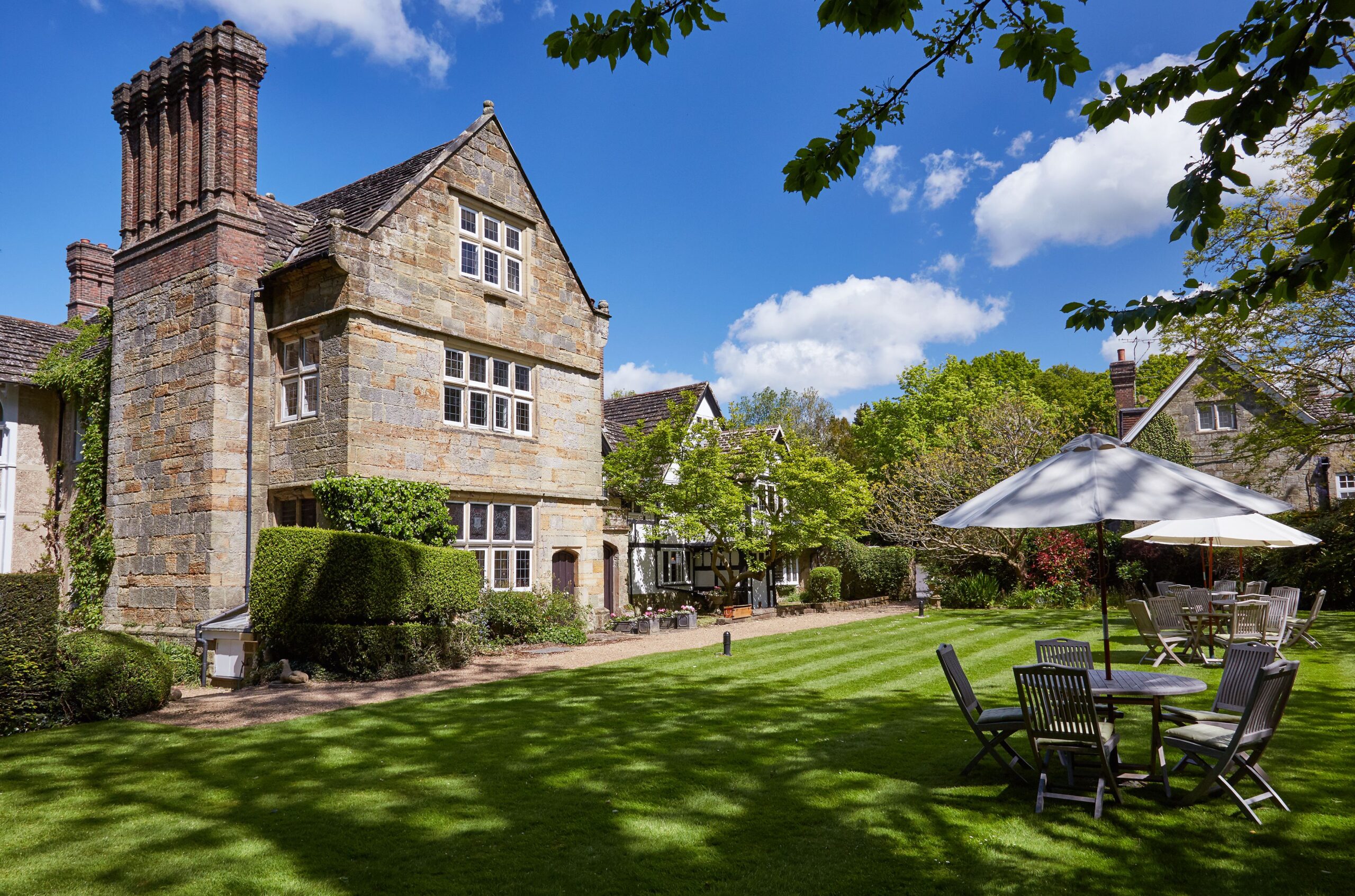 English countryside manor wi5th garden and table and chairs