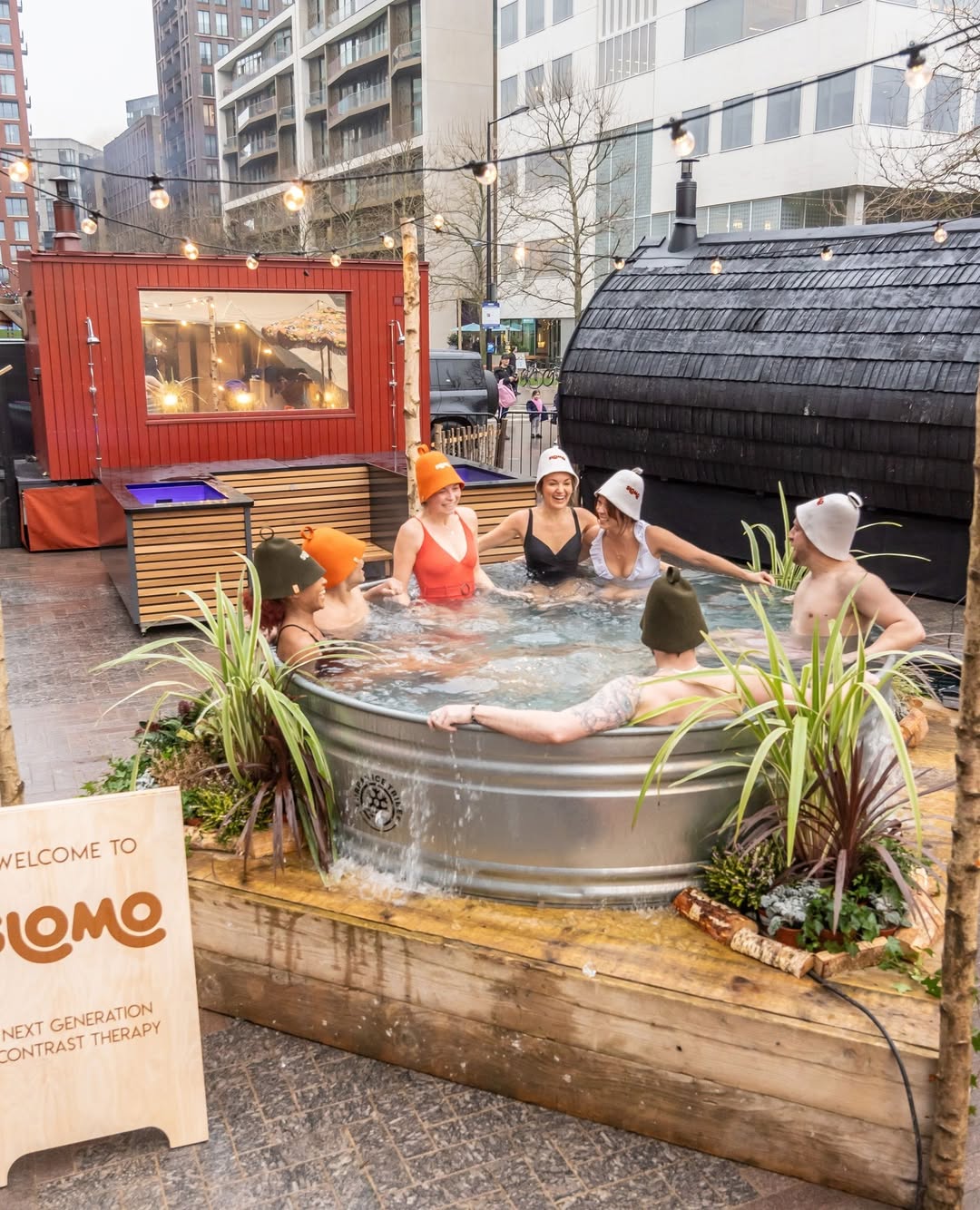 People in a cold plunge pool at Slomo