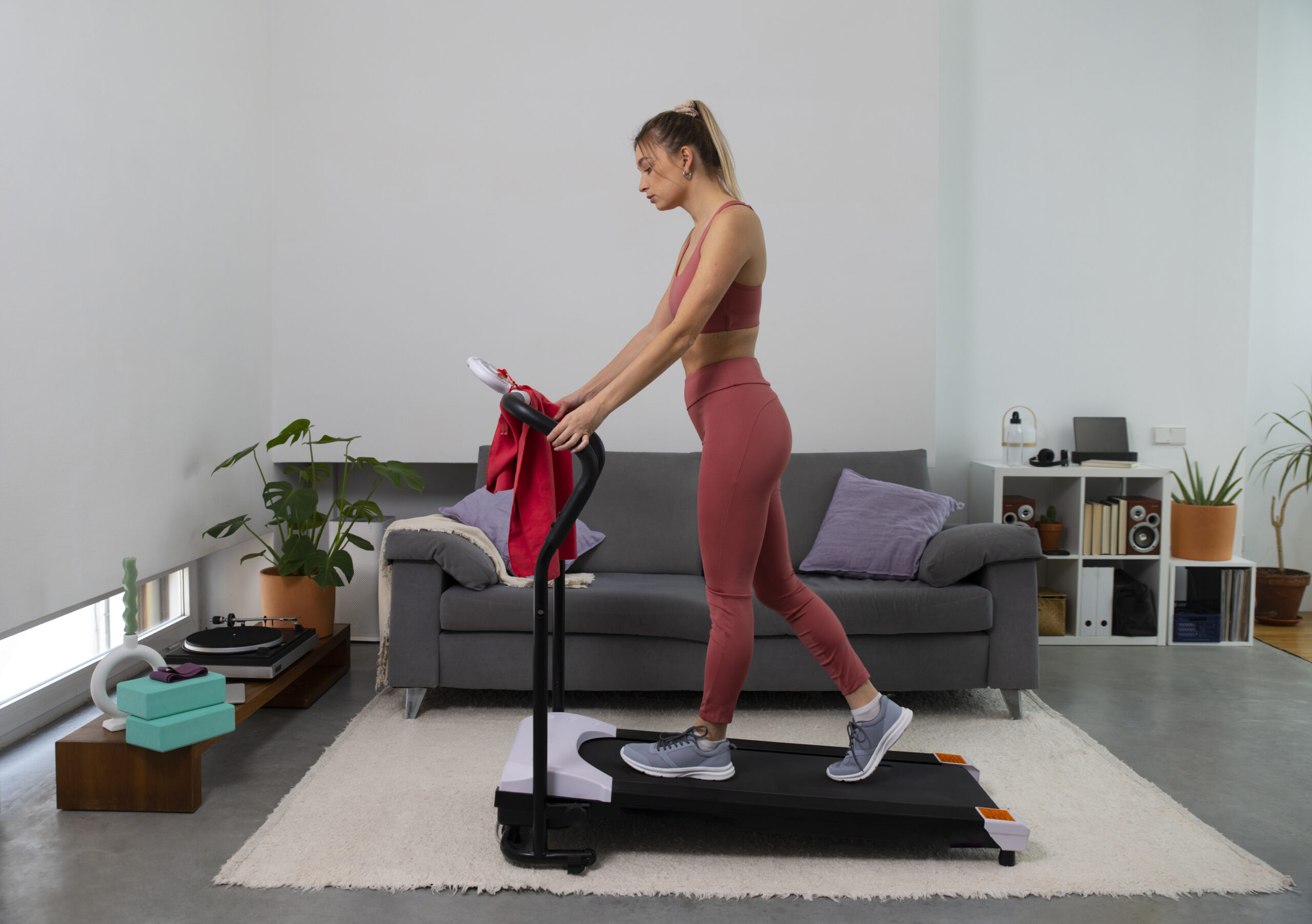 Woman walking on a treadmill