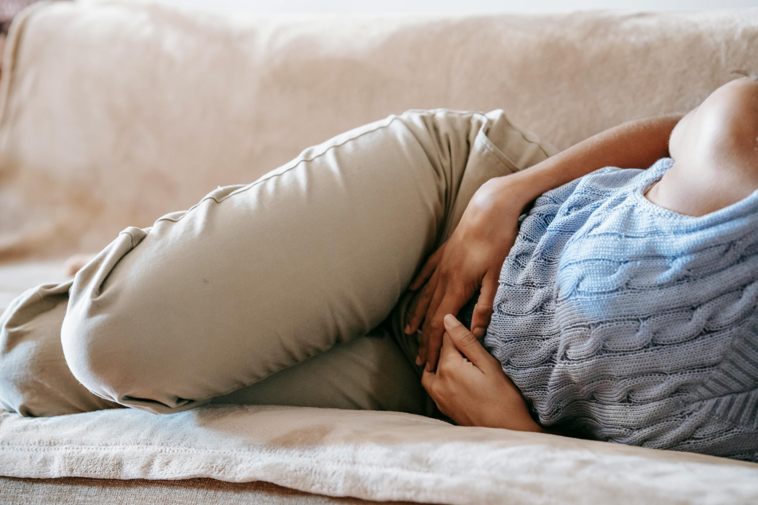 Woman with stomach cramps