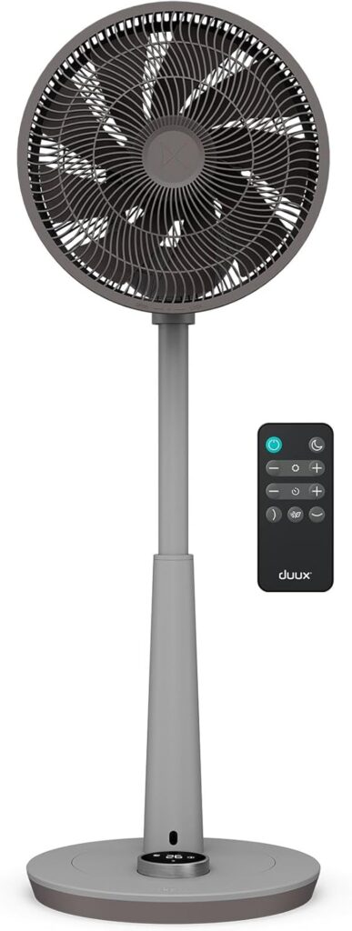 round fan with blades grey on long stand with base at bottom and on the right a remote control