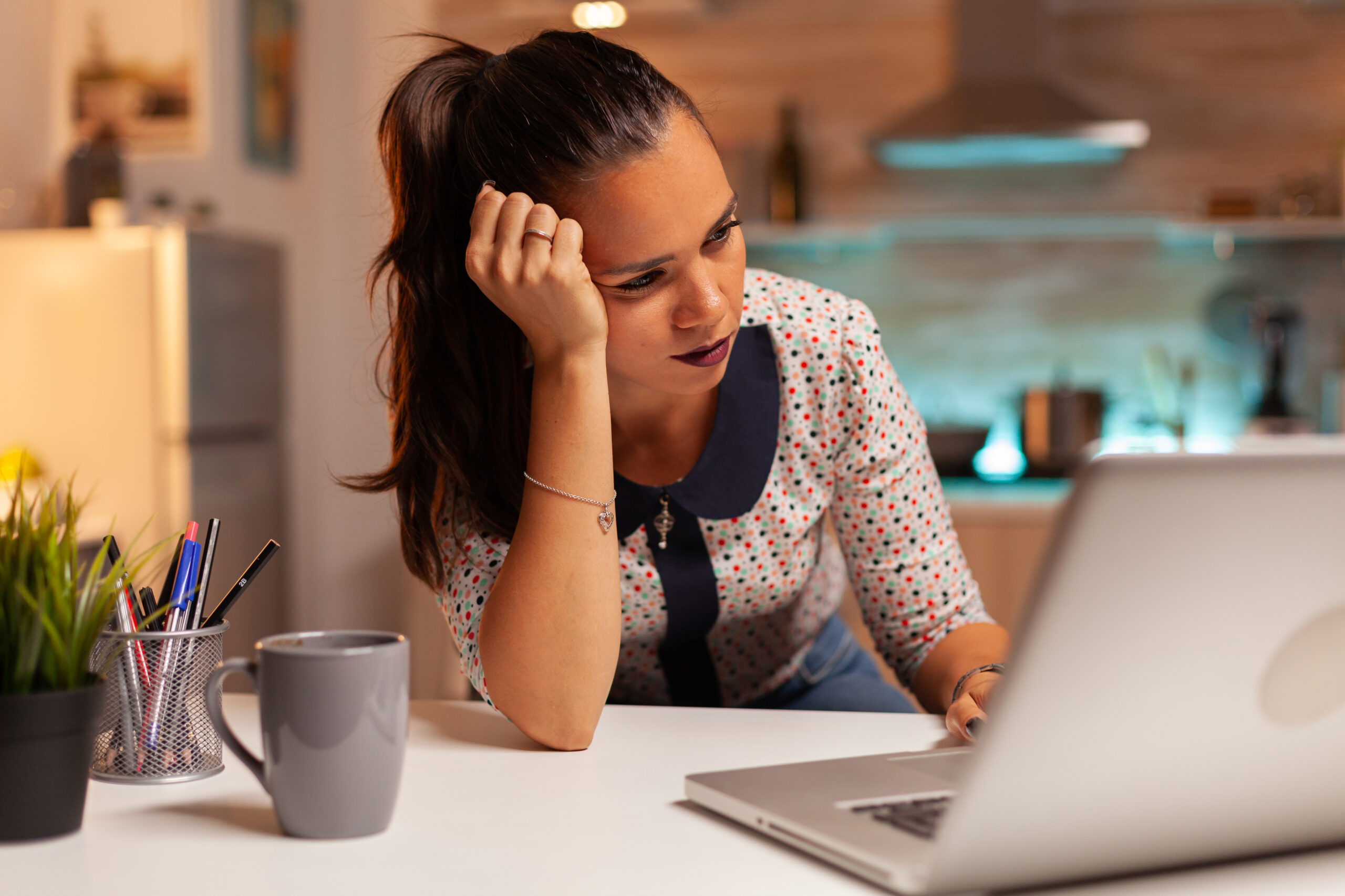 Woman stressed with her laptop