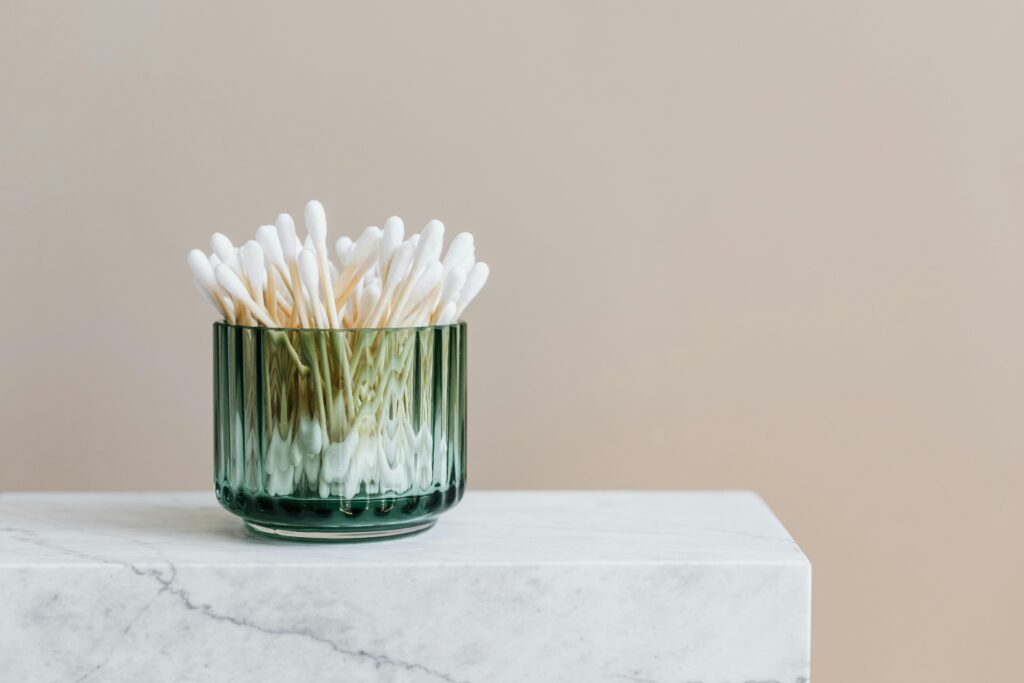 Cotton buds in blue cup 