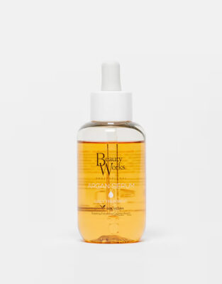 Beauty Works Argan Oil clear bottle with orange yellow liquid