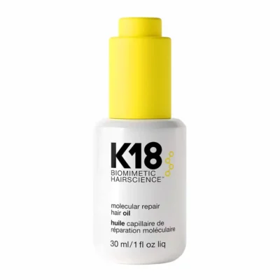 K18 Molecular Repair Oil white bottle black text yellow lid