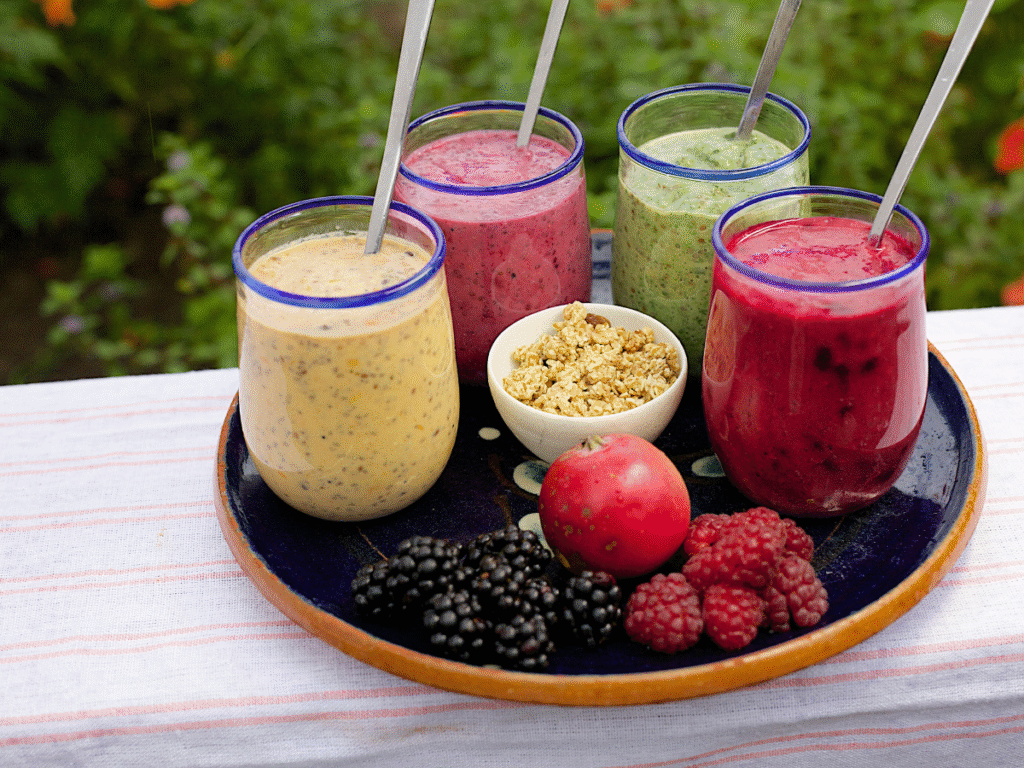A plate with glasses of smoothies