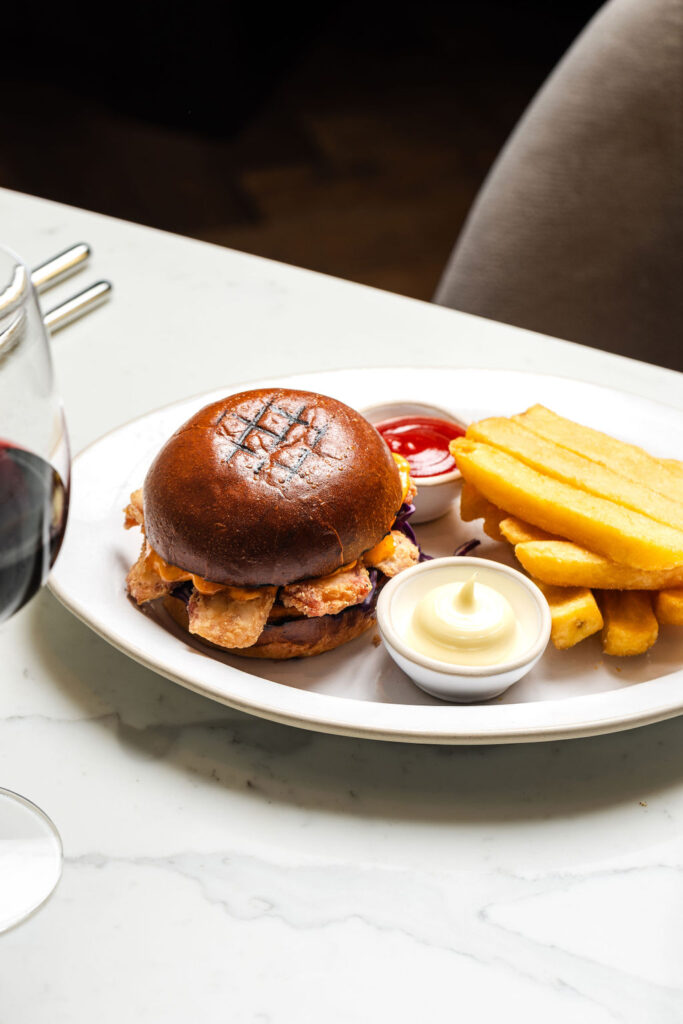 Burger and chips at Kitchen at Holmes