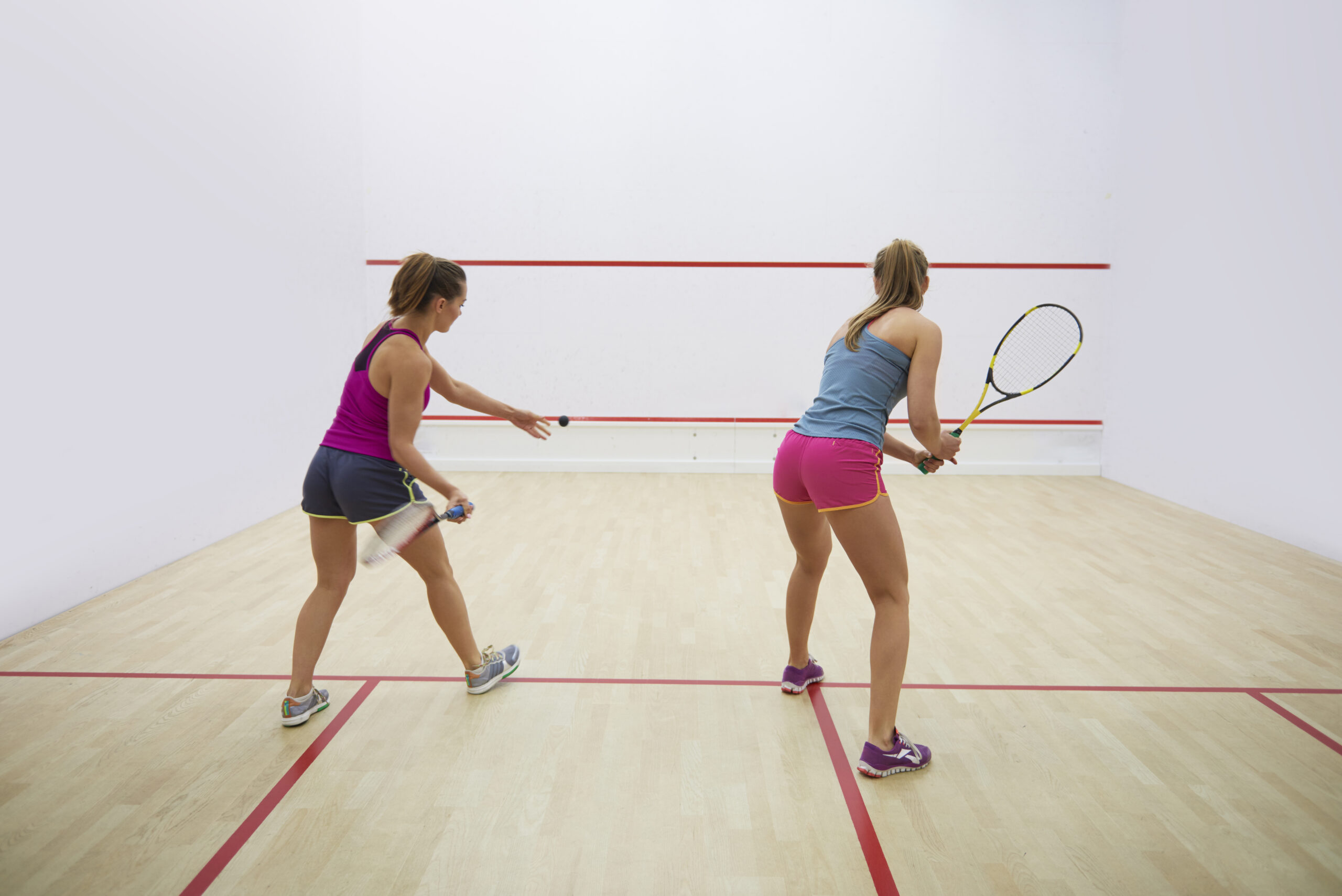 Women playing Squash