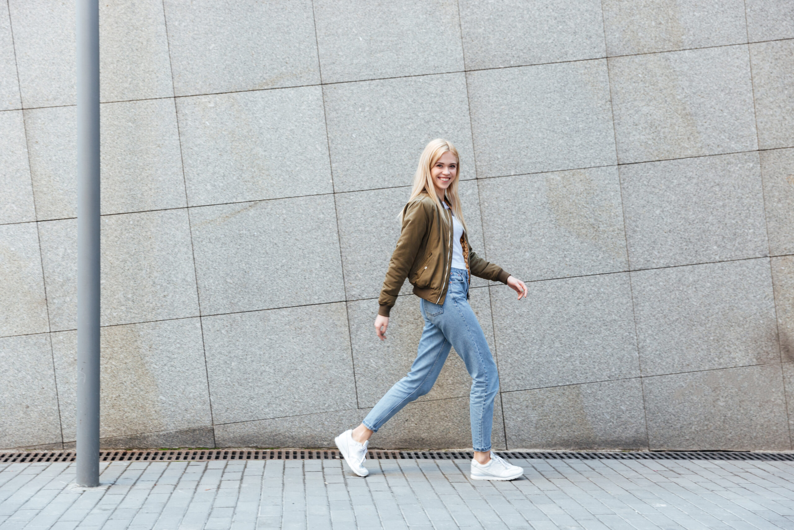 Woman walking with her arms swinging