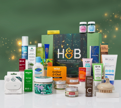 Holland & Barrett Beauty Advent Calendar on green background white table