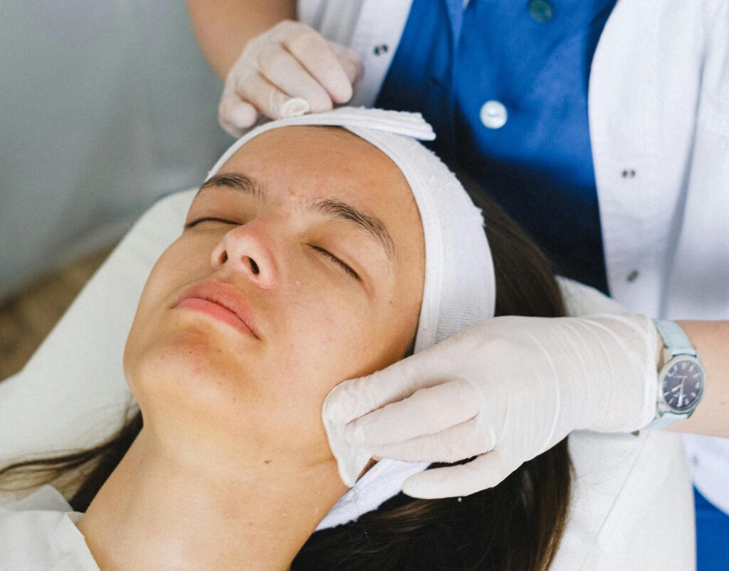 A woman getting an aesthetic treatment at a clinic 