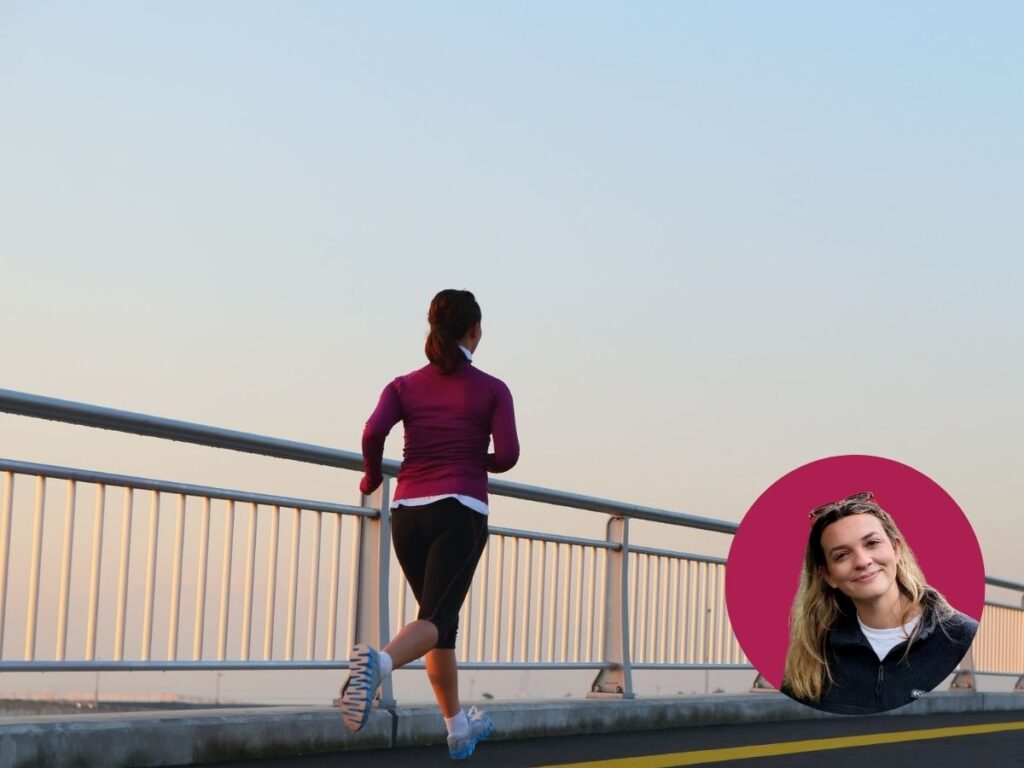 A woman runs across a bridge
