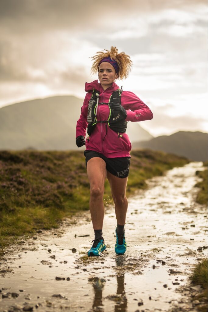 Sabrina Pace-Humphreys running on a trail