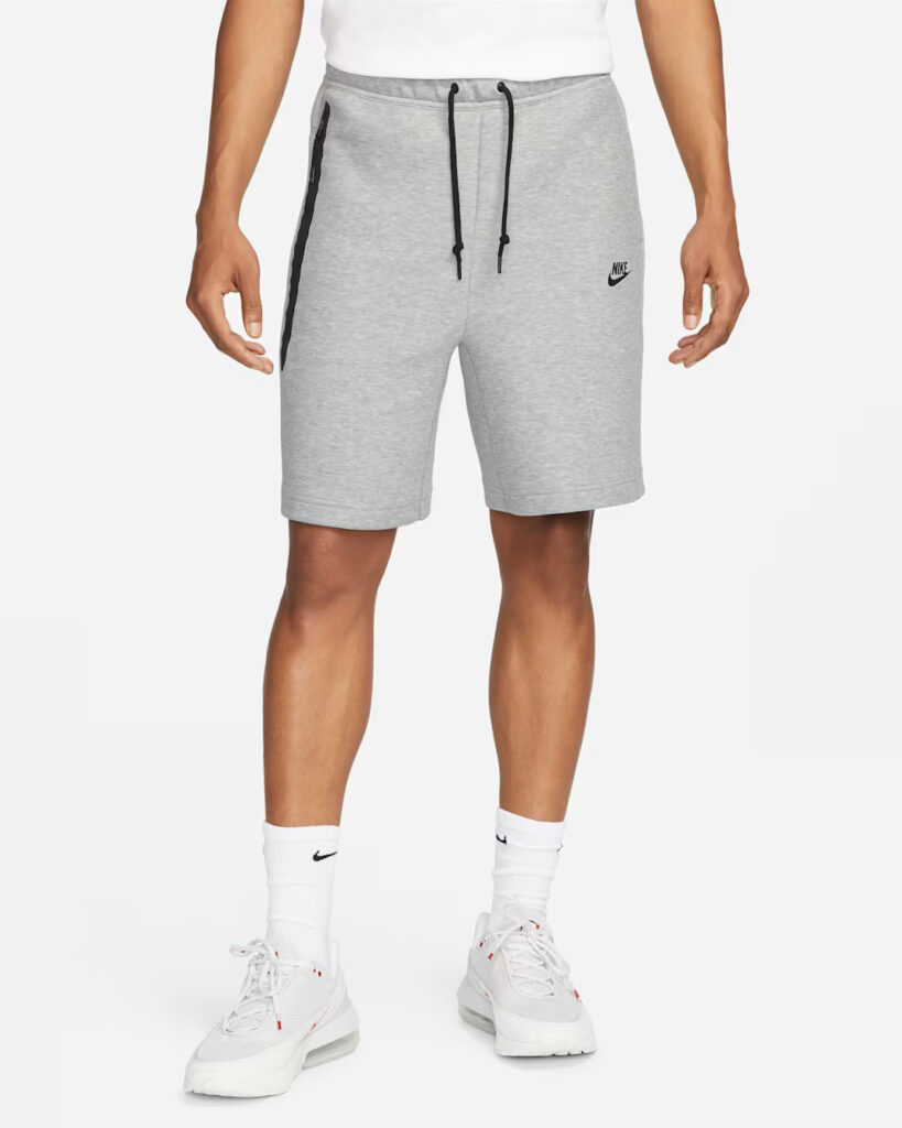 mans legs with nike grey shorts