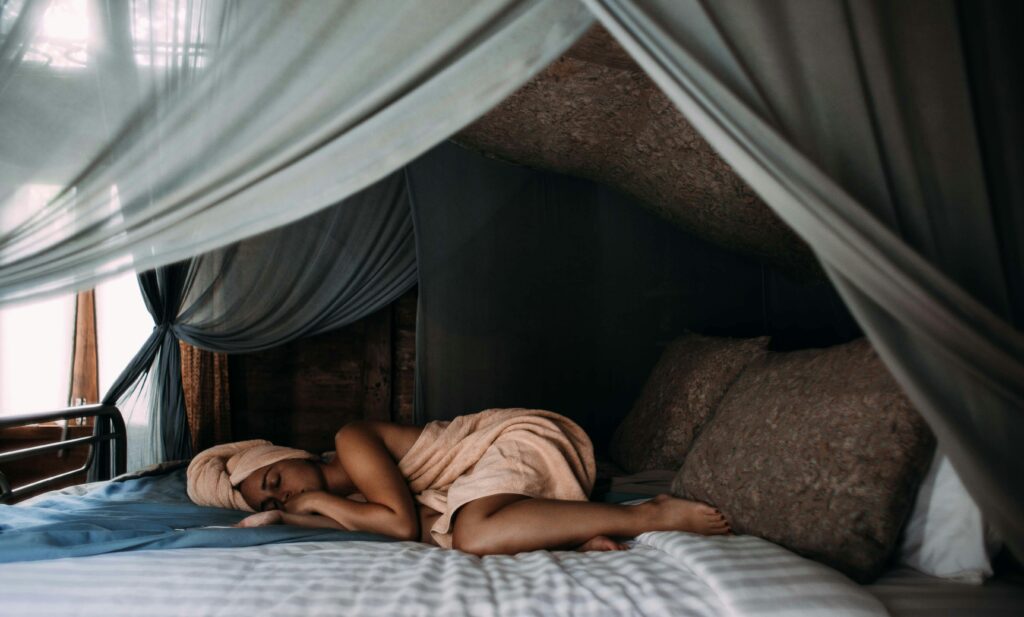 Woman sleeping in bed 