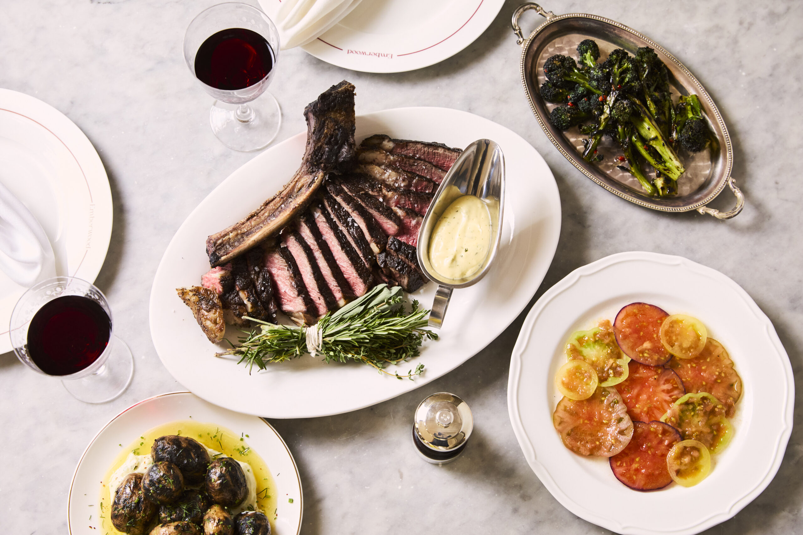 top down view of steak vegetables and wine at Emberwood Brasserie at The Francis Hotel in Bath