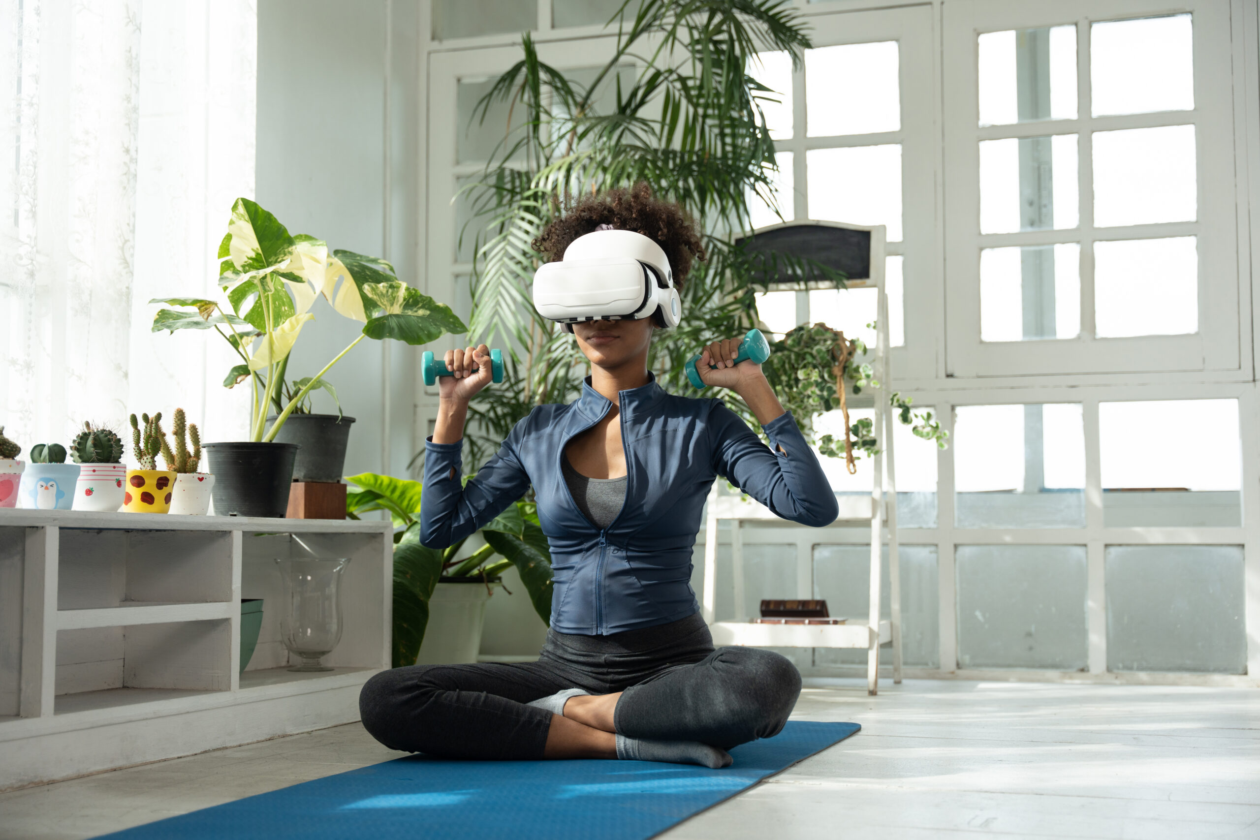 Young woman wearing virtual reality glasses exercising at home