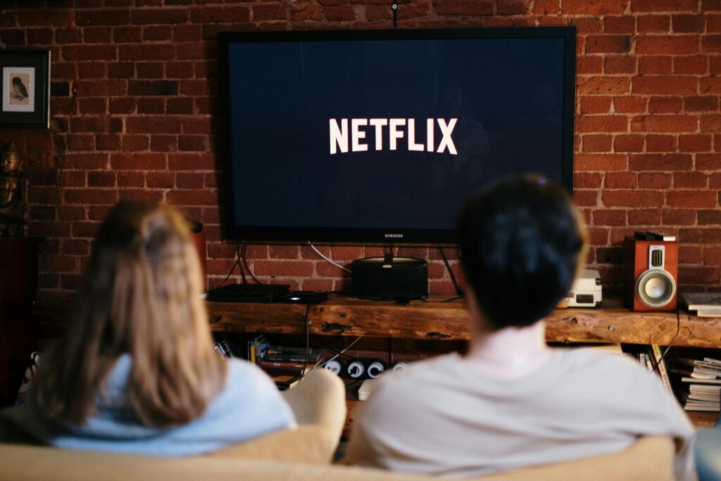 Couple watching Netflix on TV