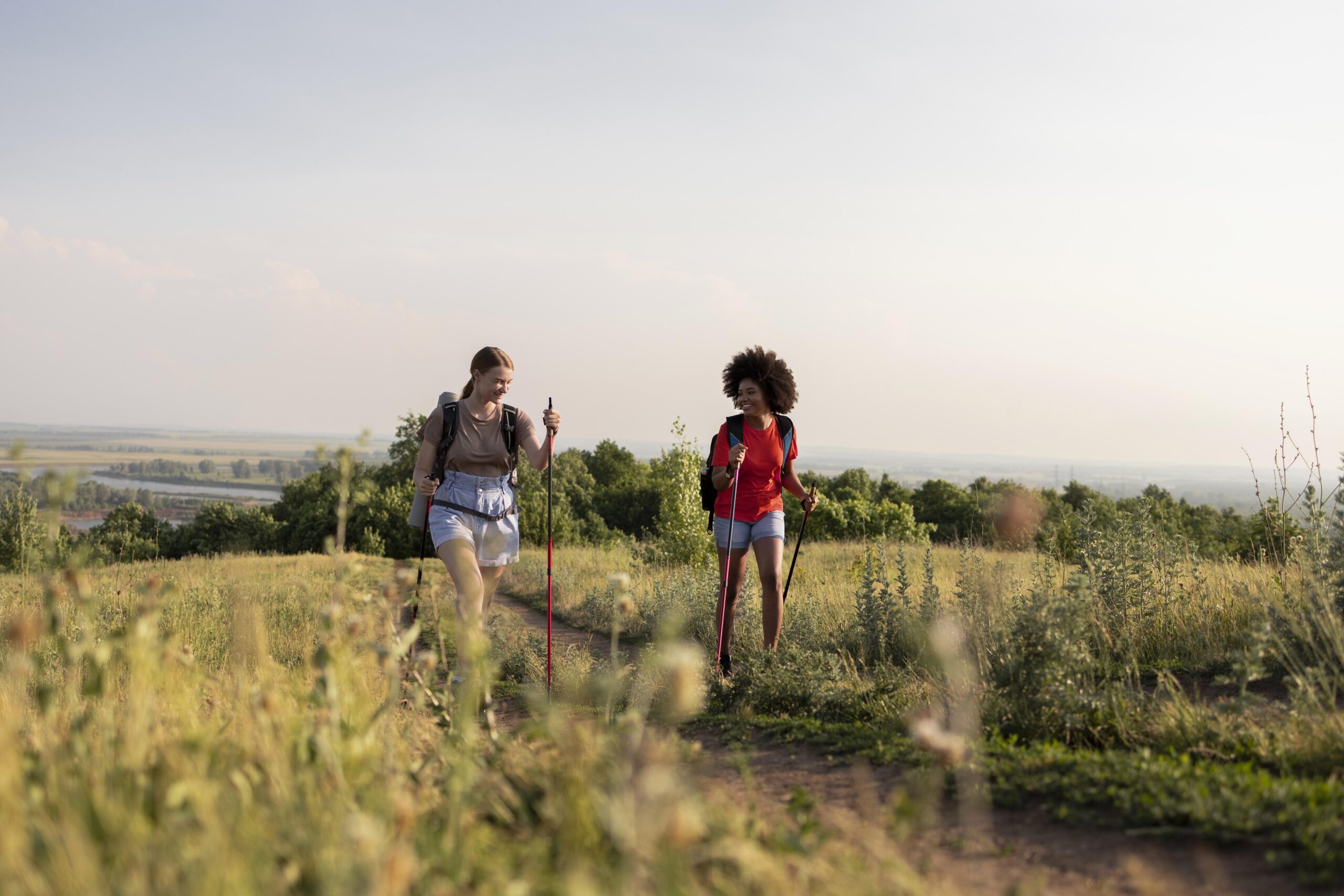 Women hiking field
