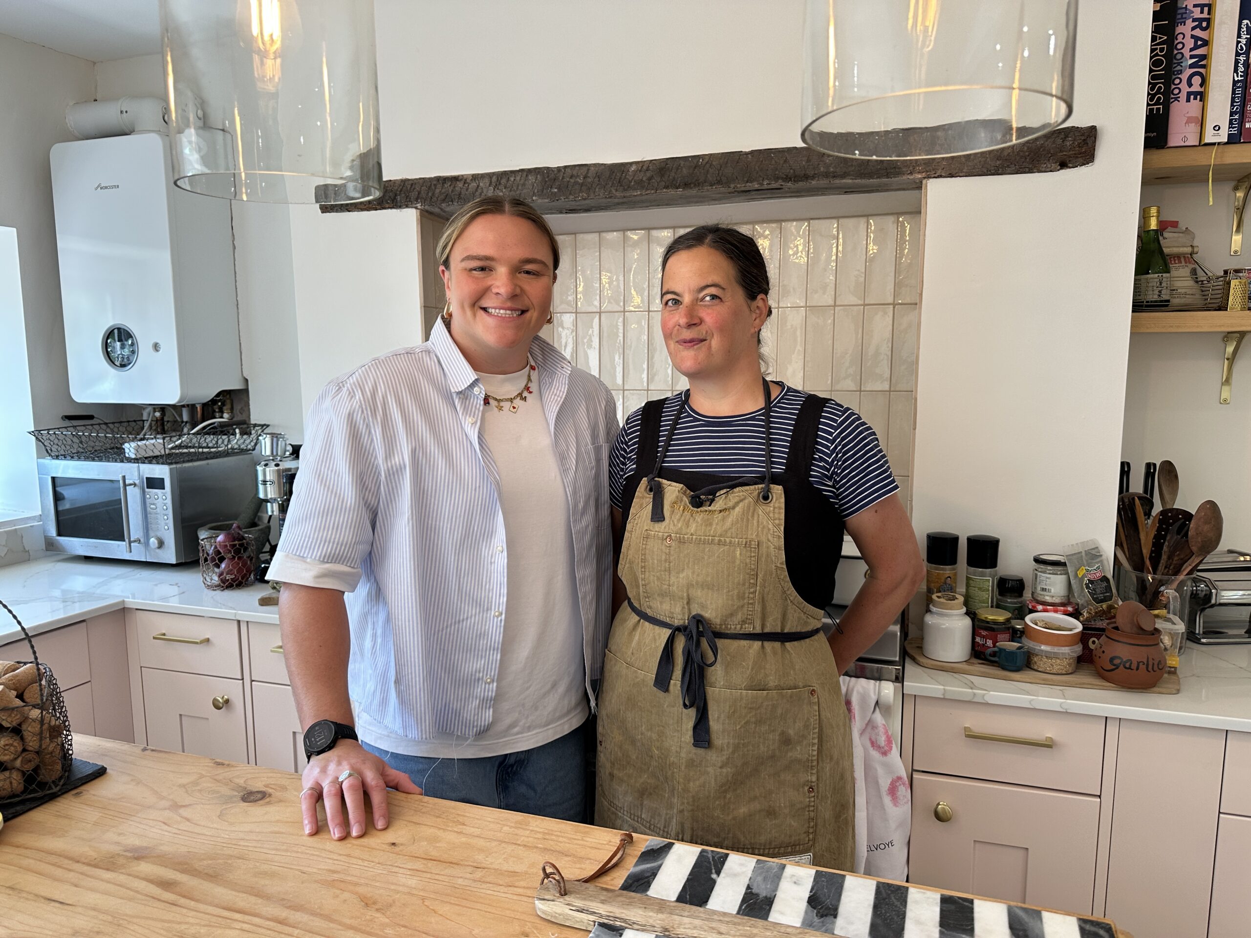 Sarah Bern and Claire Thompson in a kitchen