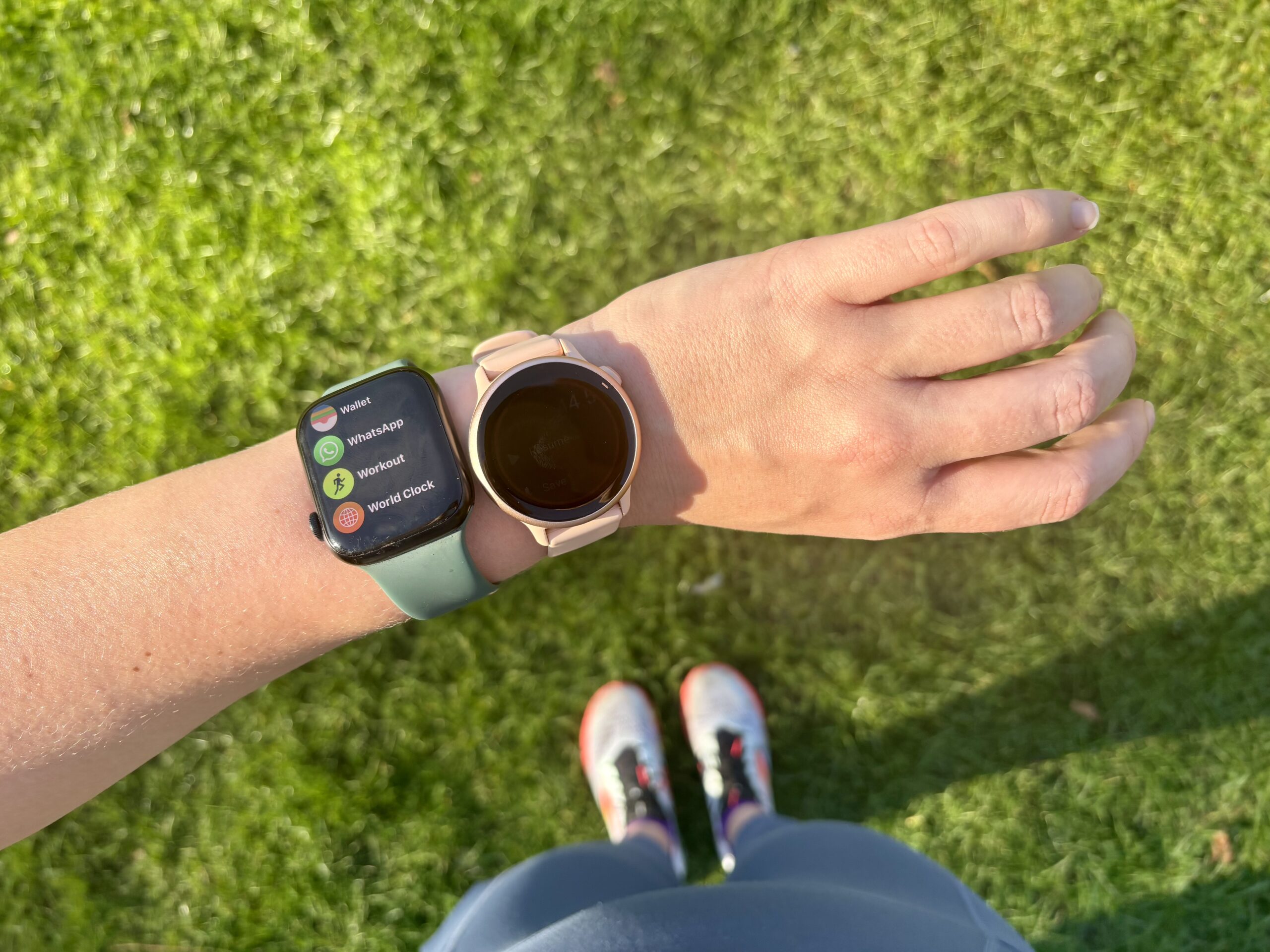 Apple Watch Series 9 and Garmin Vivoactive 6 on Evelyn's wrist
