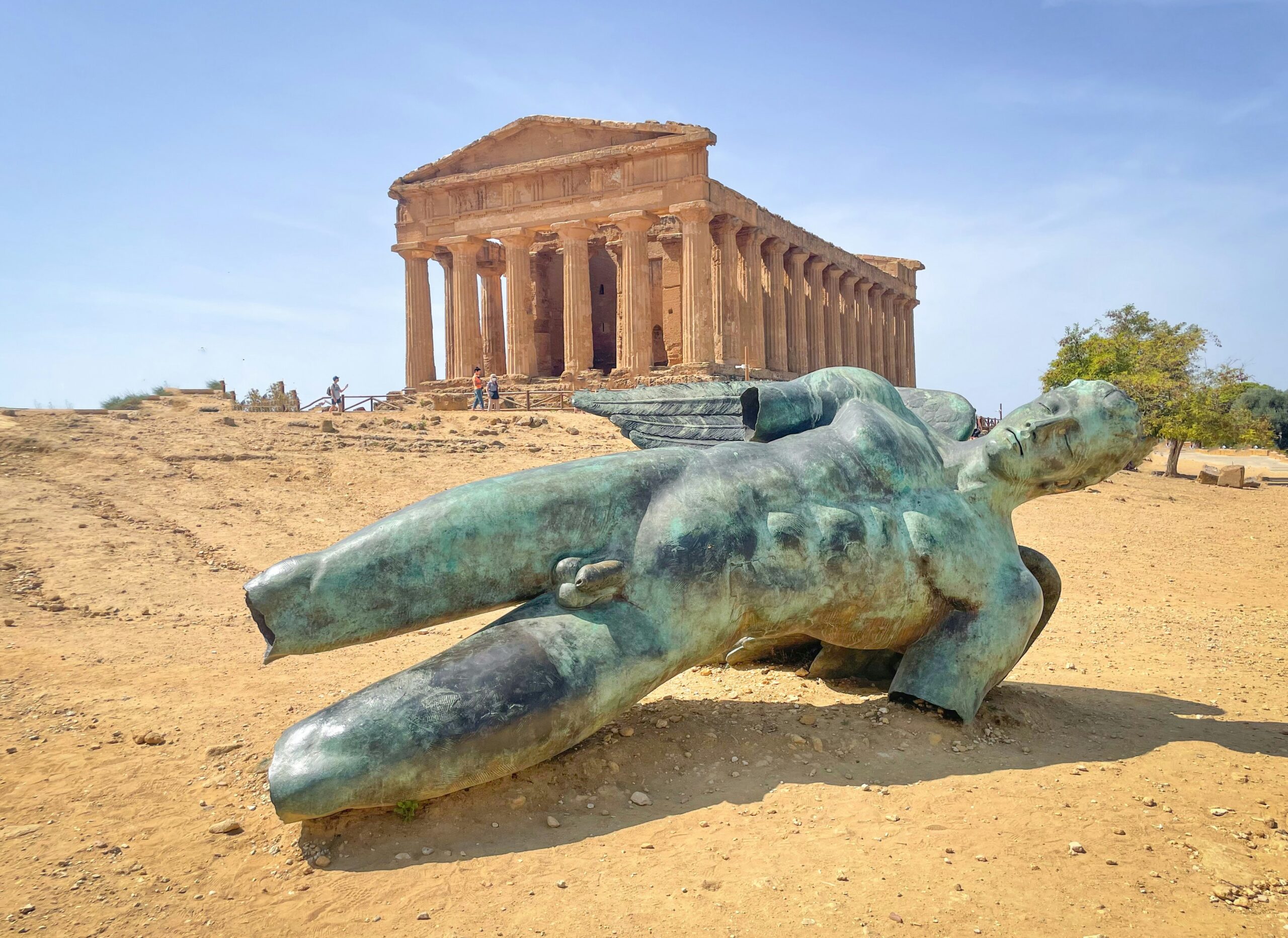 The broken Icarus statue at the base of the Temple of Concordia in Valley of Temples, Agrigento, Italy