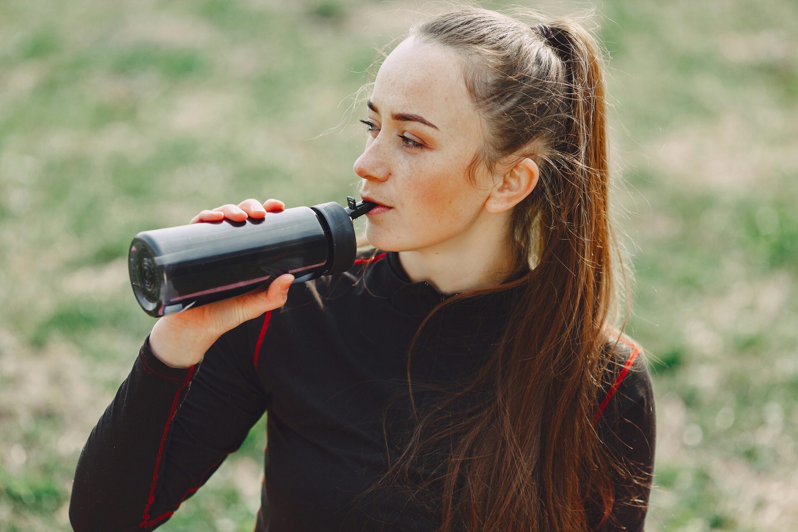 Woman drinking a water bottle