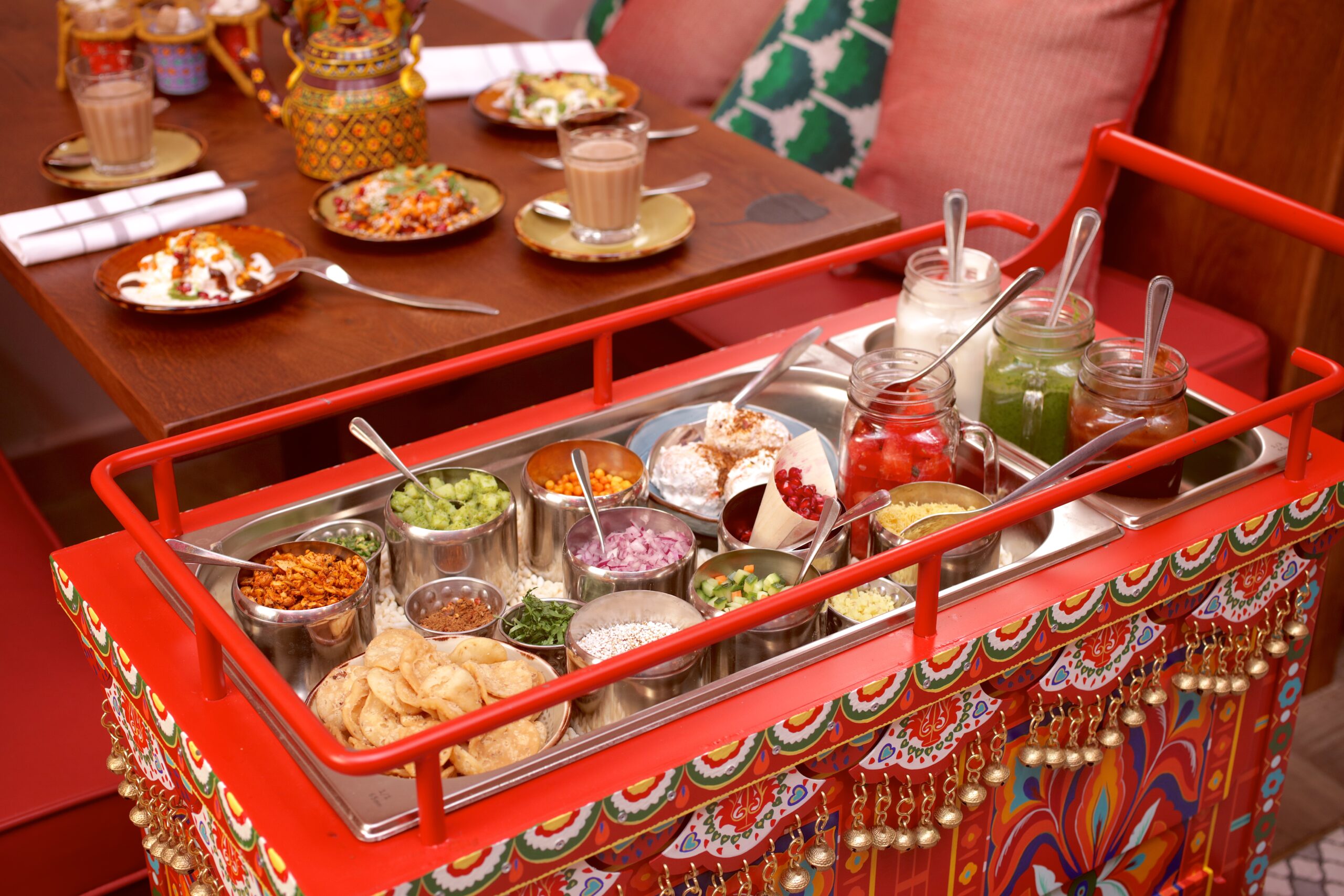 Cinammon Bazaar chaat cart red with different things in