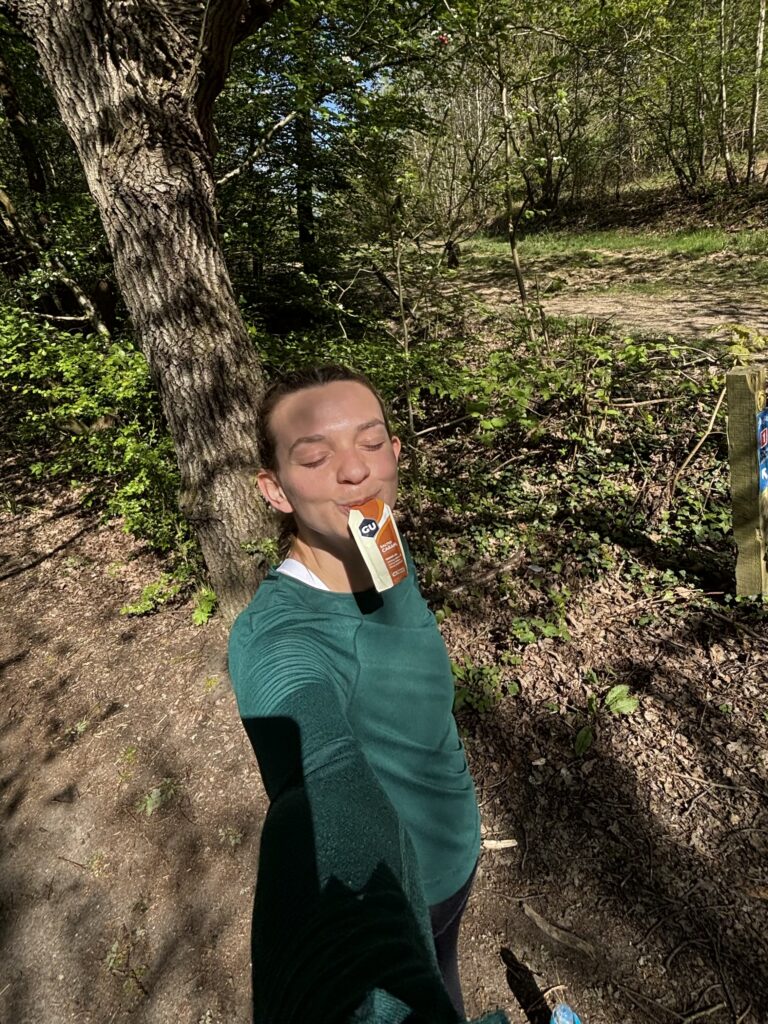 Evelyn Richards eating a GU Energy Gel