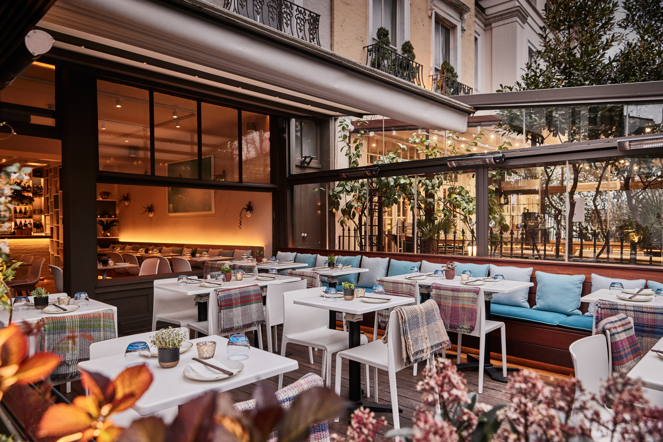 Terrace dining at ULI Notting Hill chairs tables floral