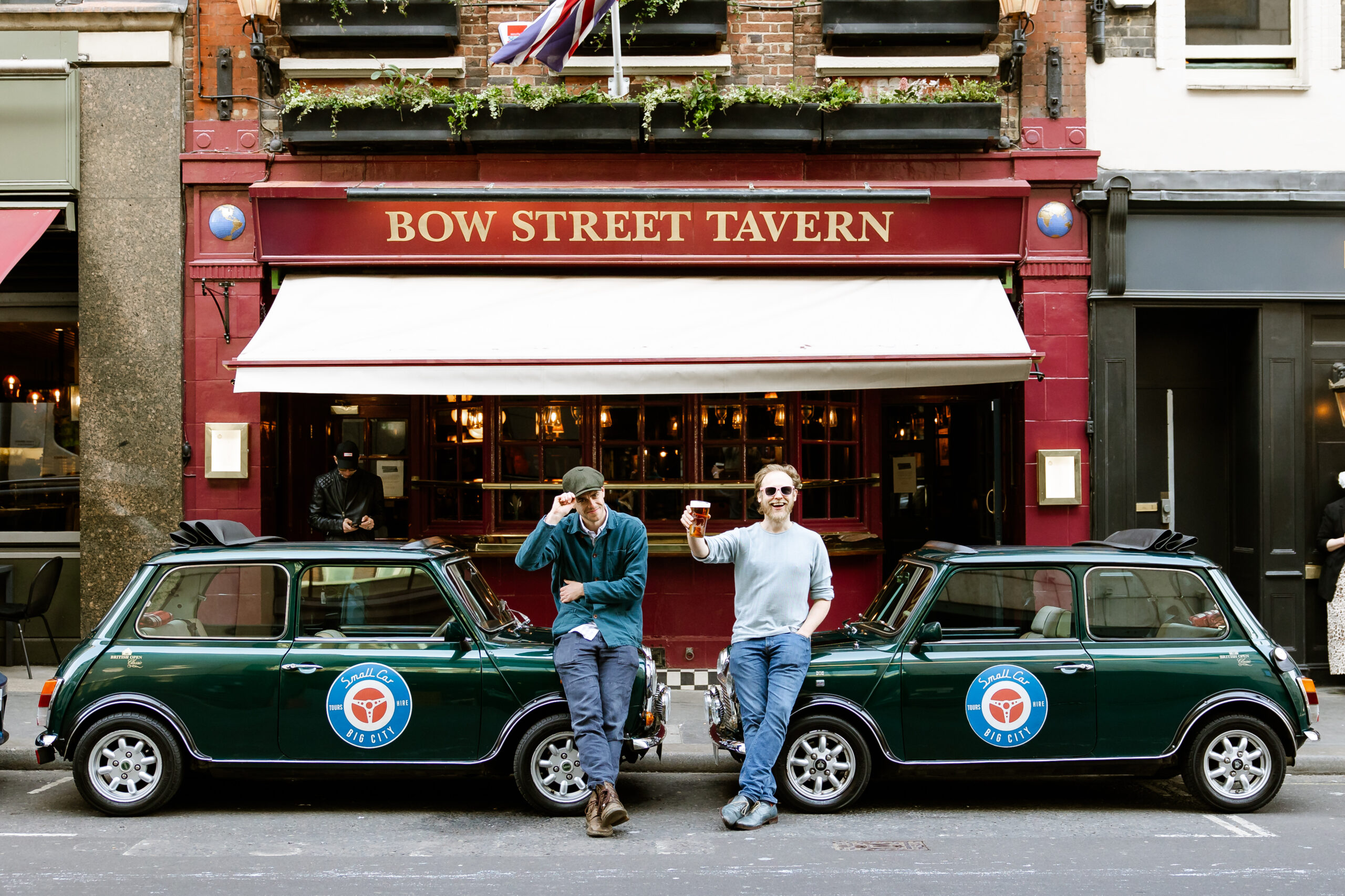 cars and men outside Bow Street Tavern london