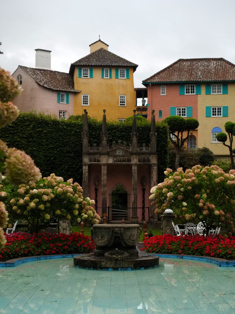 Portmeirion Italian architecture buildings by fountain