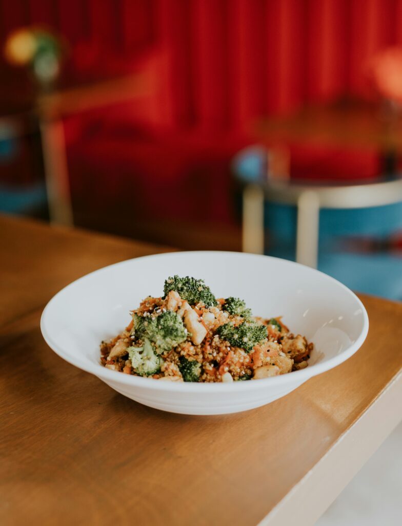 Broccoli and quinoa salad in a bowl on a table 