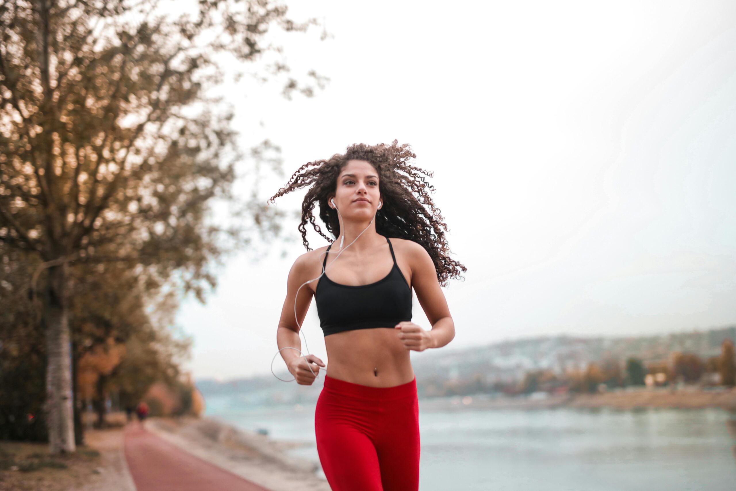 Woman running in a sports bra