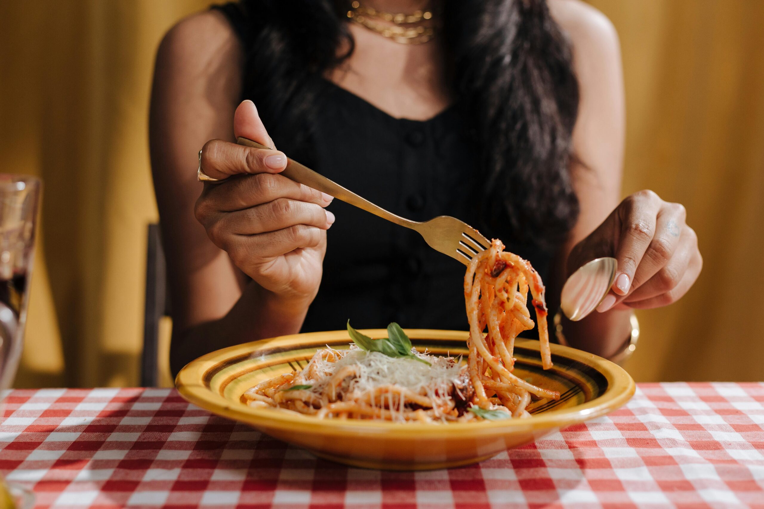 Woman eating spaghetti