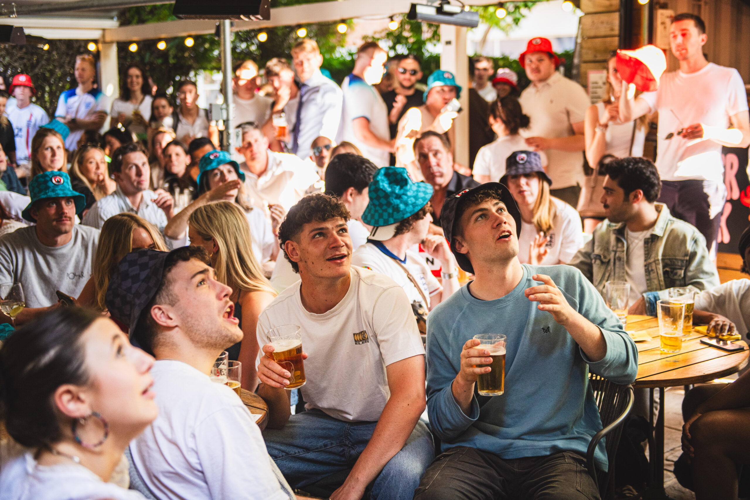 Fans watching football at a pub