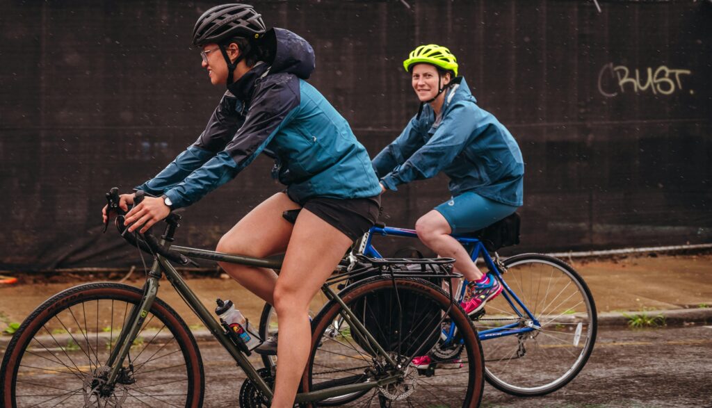 Women cycling together 