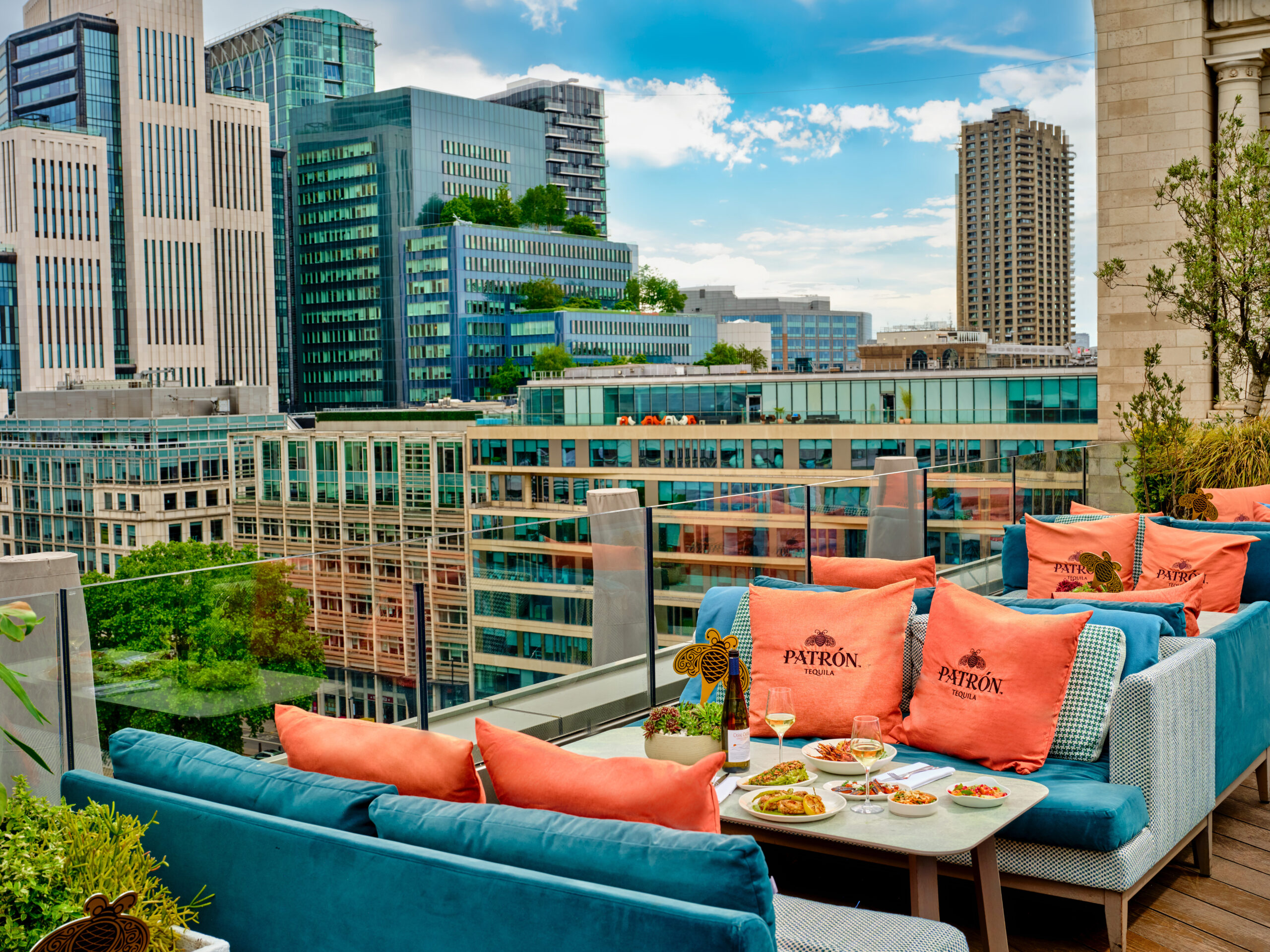 Sofas on balcony of rooftop terrace at Aviary