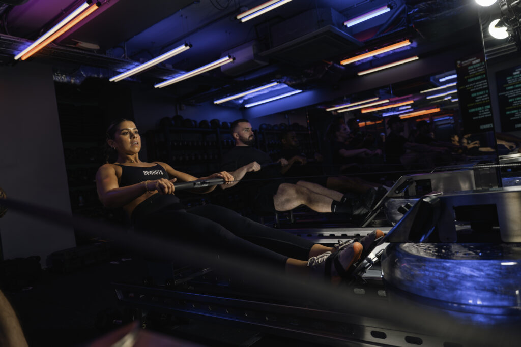 A woman on the rowing machine at Rowbots