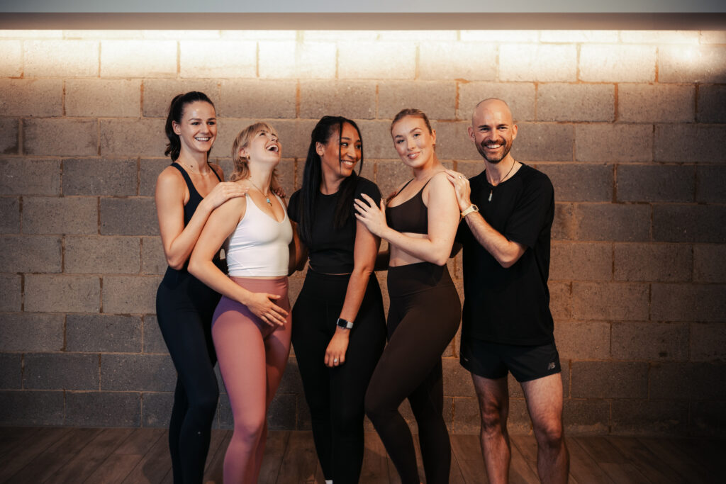 A group of people at a fitness studio