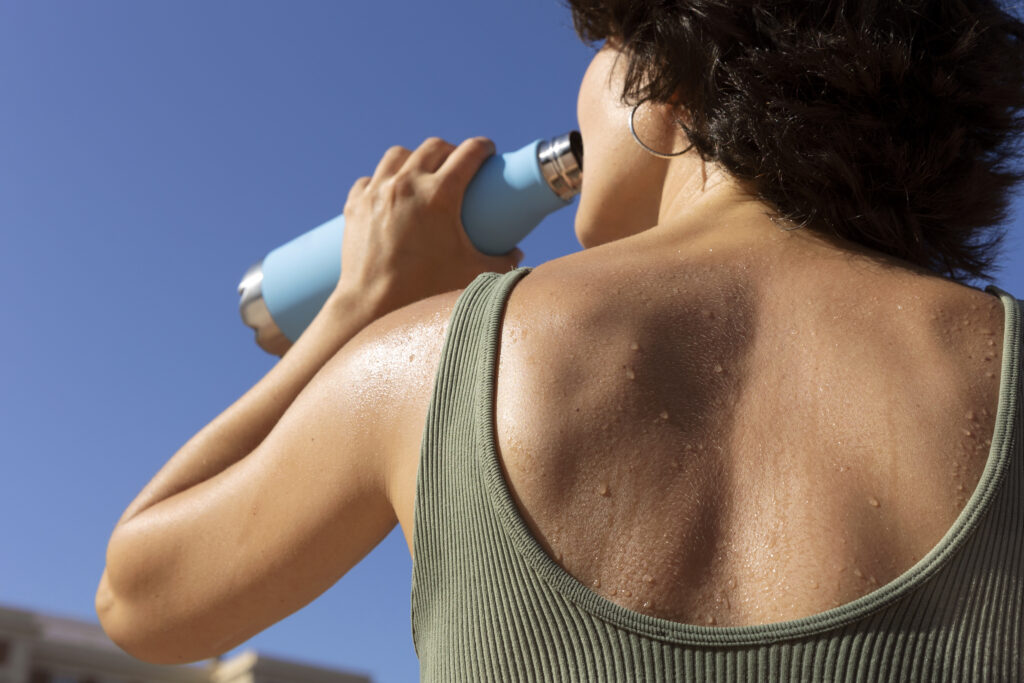 Woman sweating in the sun