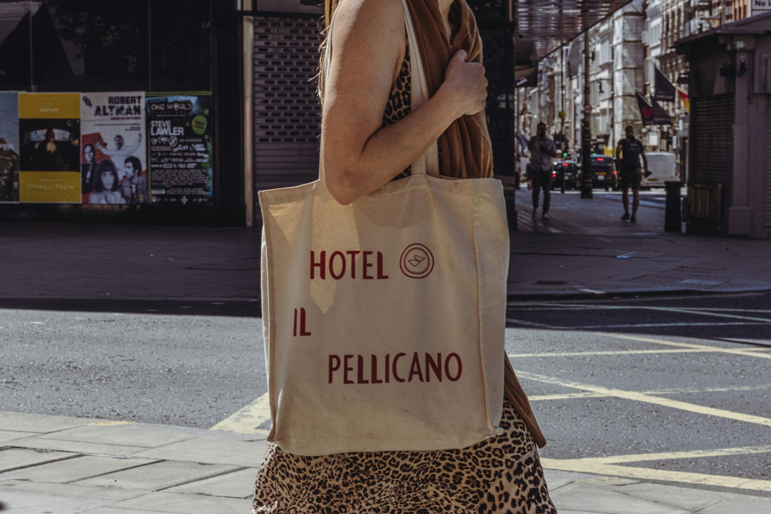 Woman walks with a tote bag