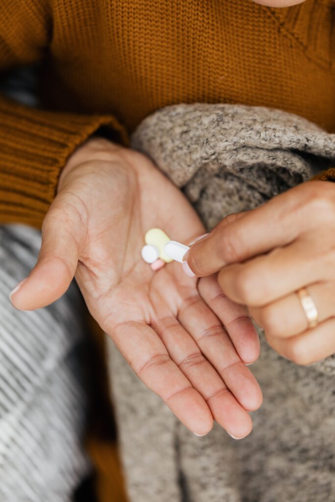 A woman taking supplements 