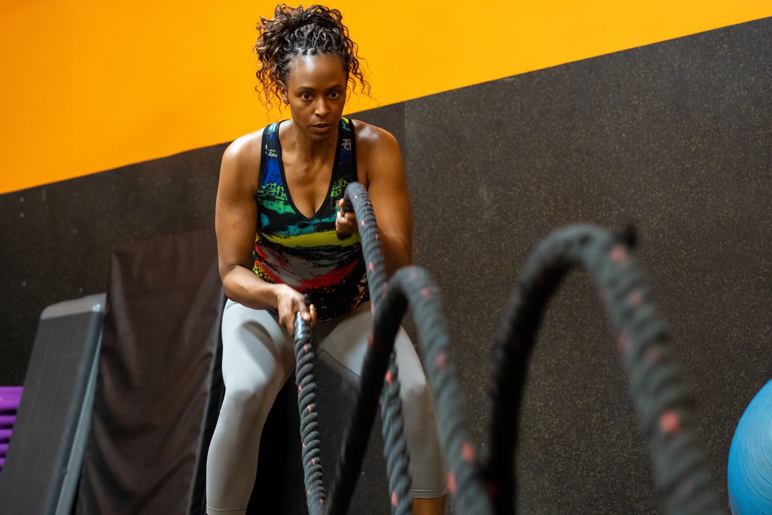 Woman exercises with ropes