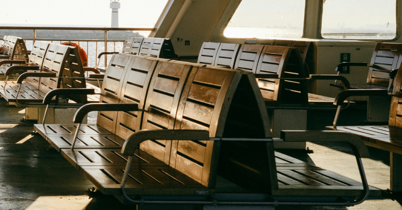 Seats on a ferry at sunset