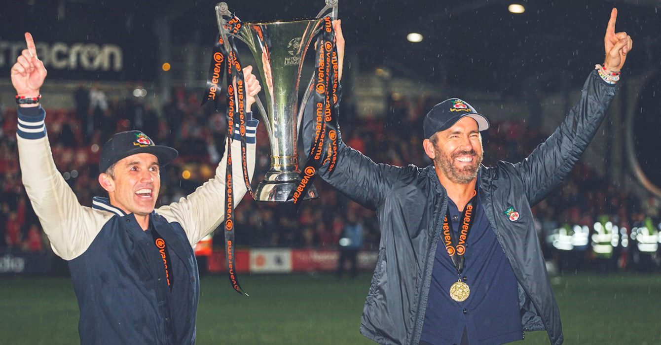 rob and ryan holding trophy