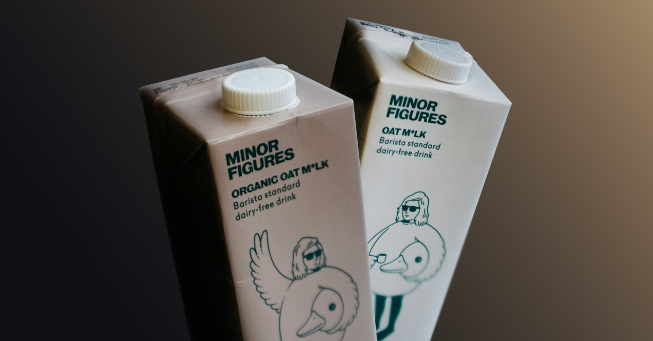 Two Minor Figures oat milk bottles next to each other.